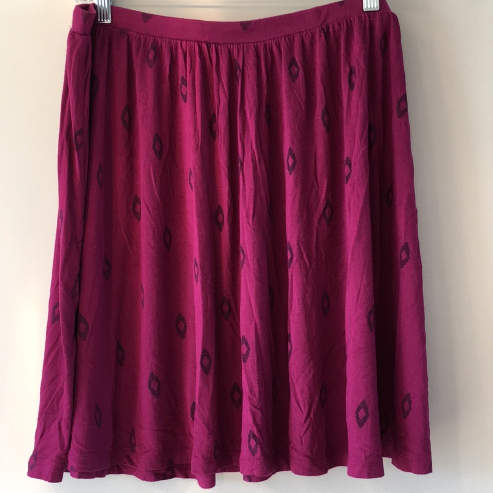 Berry mini skirt with navy tribal design